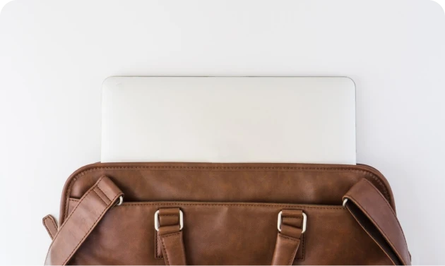 Brown briefcase with tablet